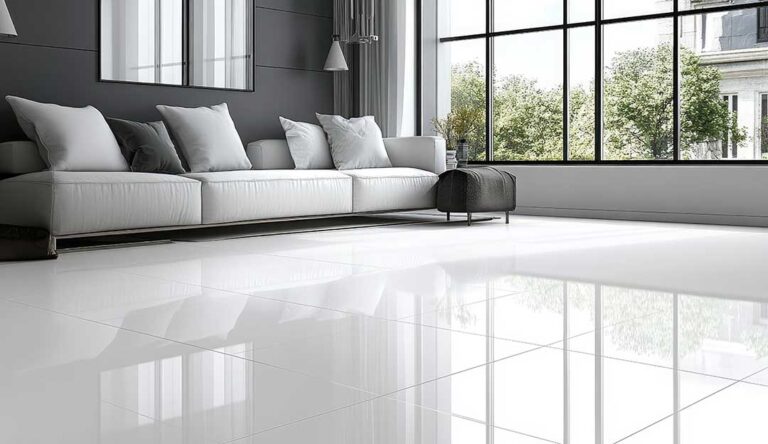 A person buffing a hardwood floor with a soft cloth to repair minor scratches.
